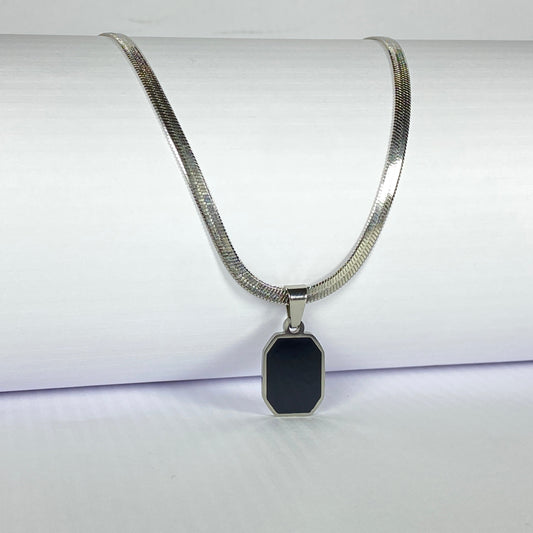 Necklace with a black pendant on a white background
